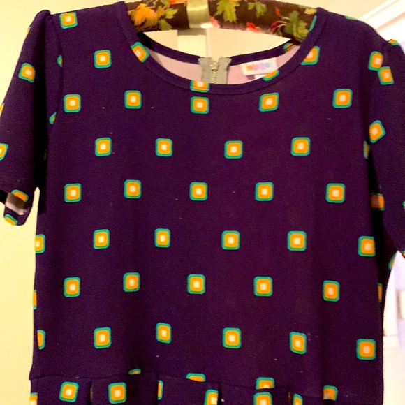 Dress LulaRoe size Large (flows and stretches ) comes with back zipper ,stretch) - Picture 1 of 2